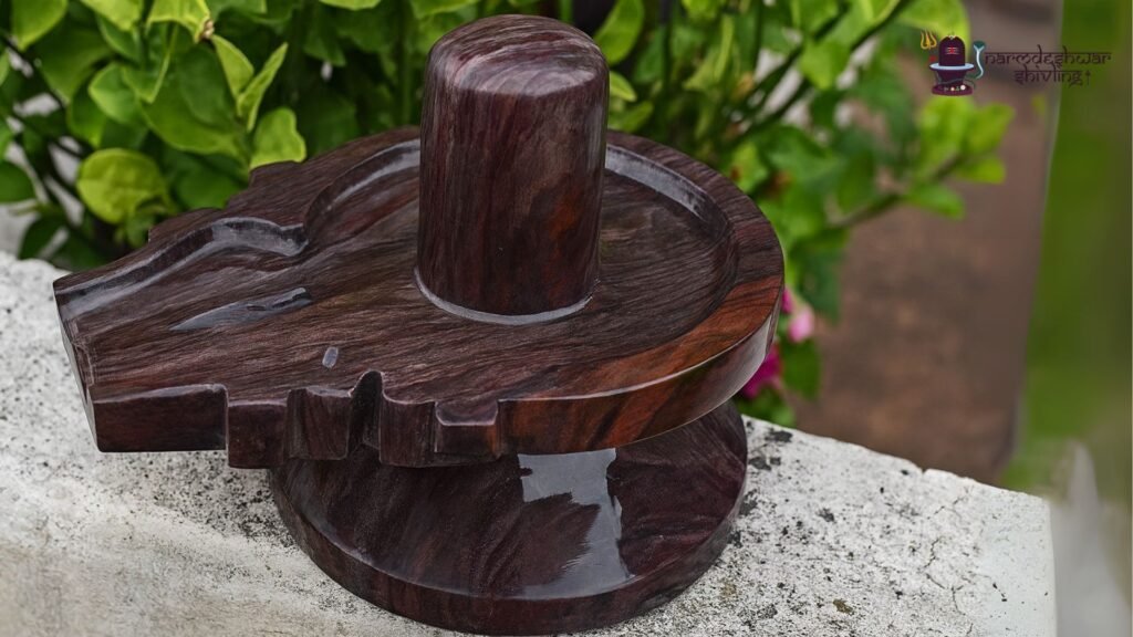 Significance of a Polished Brown Narmadeshwar Shivling with Jaladhari